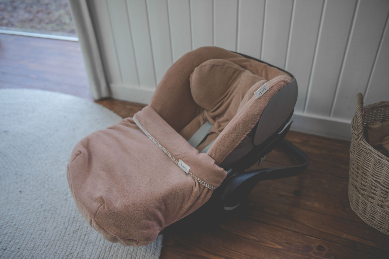 Mbeshtjellese per sexholinon e makines/Car seat cover blanket- Koeka